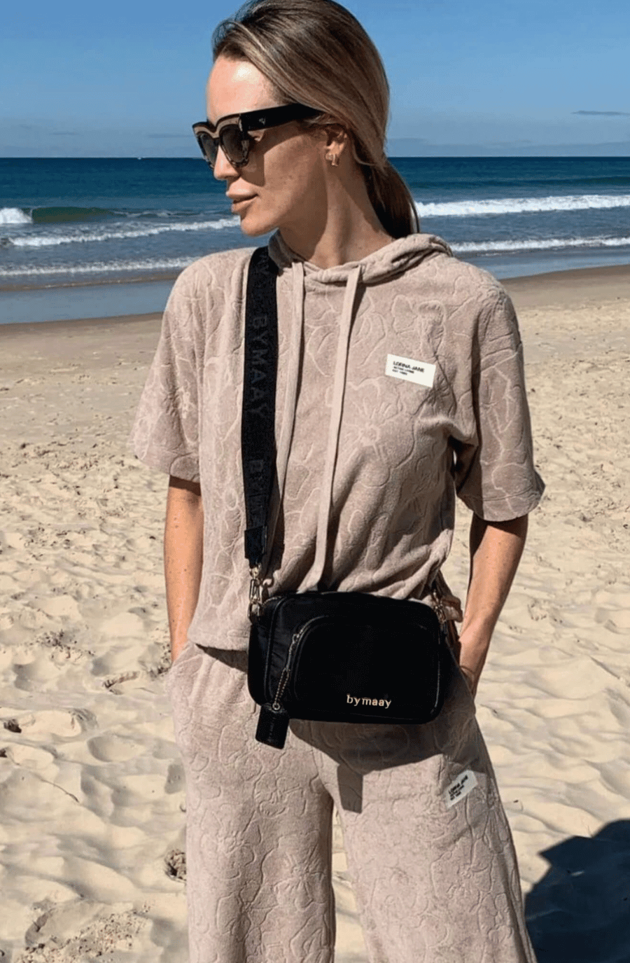 Black gold top crossbody bag